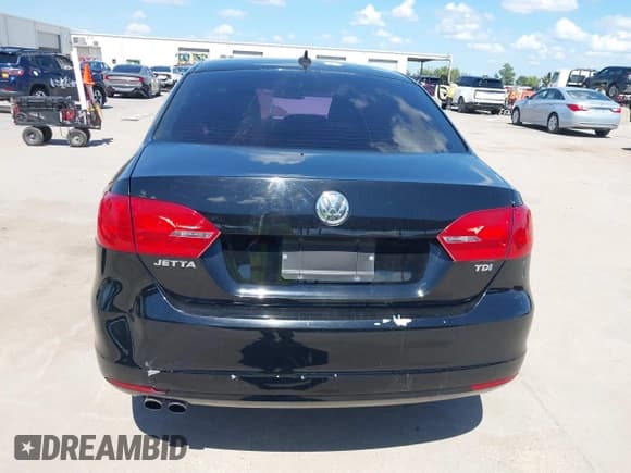 ✅ 2012 Volkswagen Jetta TDI w/Premium & Nav • VIN: 3VWLL7AJ0CM410008 • Lot: 43011566. Listed on IAAI with 207,018 mi. Free auction sales archive from the USA and detailed vehicle history report at DreamBid. Image 16.