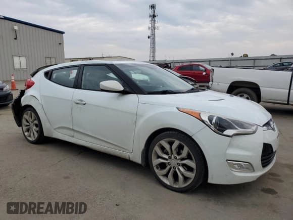 ✅ 2012 Hyundai Veloster w/Gray Int • VIN: KMHTC6AD6CU078414 • Lot: 43662545. Listed on Copart with 121,233 mi. Free auction sales archive from the USA and detailed vehicle history report at DreamBid. Image 4.