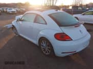 ✅ 2018 Volkswagen Beetle SE • VIN: 3VWJD7AT7JM711667 • Лот: 43696363. Опубликован ранее на IAAI с пробегом 60 156 миль. Бесплатный доступ к архиву аукционных продаж из США и подробный отчёт об истории автомобиля на DreamBid. Изображение 3.