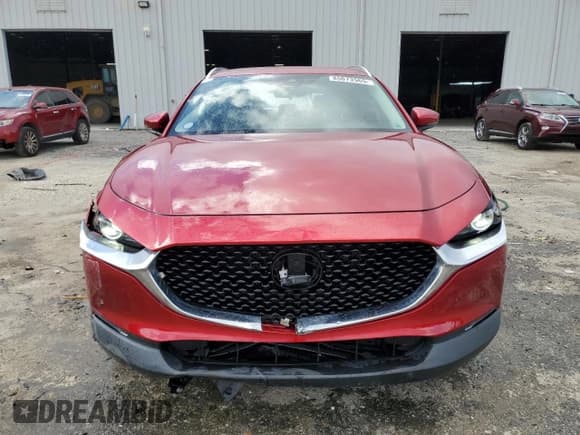 ✅ 2023 Mazda CX-30 S Carbon Edition • VIN: 3MVDMBCM5PM525674 • Лот: 85673565. Опубликован ранее на Copart с пробегом 12 888 миль. Бесплатный доступ к архиву аукционных продаж из США и подробный отчёт об истории автомобиля на DreamBid. Изображение 5.