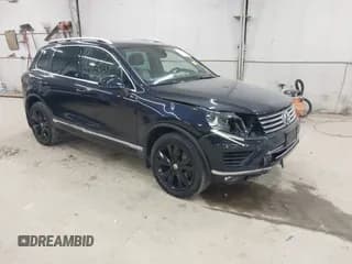 ✅ 2017 Volkswagen Touareg Wolfsburg Edition • VIN: WVGRF7BP2HD005662 • Lot: 43187051. Listed on IAAI with 131,245 mi. Free auction sales archive from the USA and detailed vehicle history report at DreamBid. Image 1.