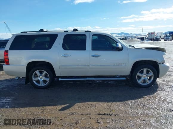 ✅ 2012 Chevrolet Suburban LTZ • VIN: 1GNSKKE77CR101774 • Lot: 41614875. Listed on IAAI with 207,263 mi. Free auction sales archive from the USA and detailed vehicle history report at DreamBid. Image 14.