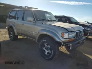 ✅ 1997 Lexus LX 450 • VIN: JT6HJ88J6V0167635 • Лот: 91500055. Опубликован ранее на Copart с пробегом 236 693 миль. Бесплатный доступ к архиву аукционных продаж из США и подробный отчёт об истории автомобиля на DreamBid. Изображение 4.