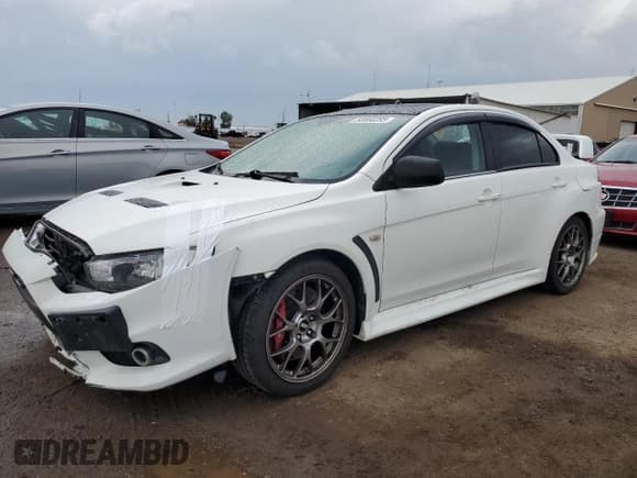 ✅ 2014 Mitsubishi Lancer Evolution MR • VIN: JA32W5FV3EU023181 • Лот: 58660285. Опубликован ранее на Copart с пробегом 102 186 миль. Бесплатный доступ к архиву аукционных продаж из США и подробный отчёт об истории автомобиля на DreamBid. Изображение 1.