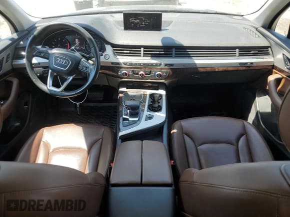 ✅ 2018 Audi Q7 Premium • VIN: WA1AHAF78JD001179 • Лот: 71205905. Опубликован ранее на Copart с пробегом 103 270 миль. Бесплатный доступ к архиву аукционных продаж из США и подробный отчёт об истории автомобиля на DreamBid. Изображение 8.