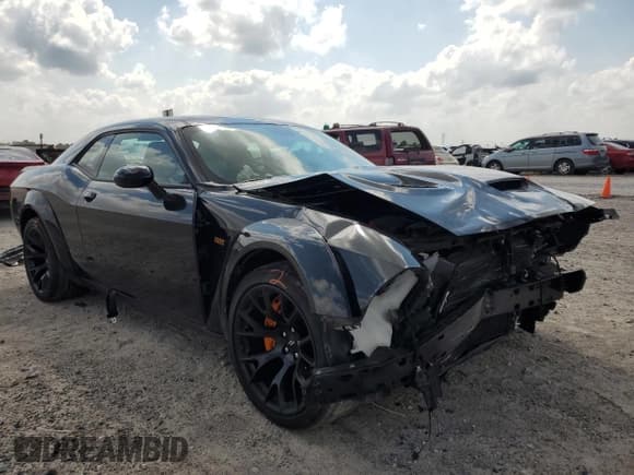 ✅ 2022 Dodge Challenger R/T Scat Pack Widebody • VIN: 2C3CDZFJ7NH122528 • Lot: 67906613. Listed on Copart with 12,809 mi. Free auction sales archive from the USA and detailed vehicle history report at DreamBid. Image 4.