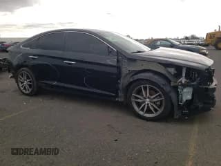 ✅ 2015 Hyundai Sonata Sport • VIN: 5NPE34AB6FH194615 • Lot: 36768773. Listed on Copart with 103,094 mi. Free auction sales archive from the USA and detailed vehicle history report at DreamBid. Image 4.