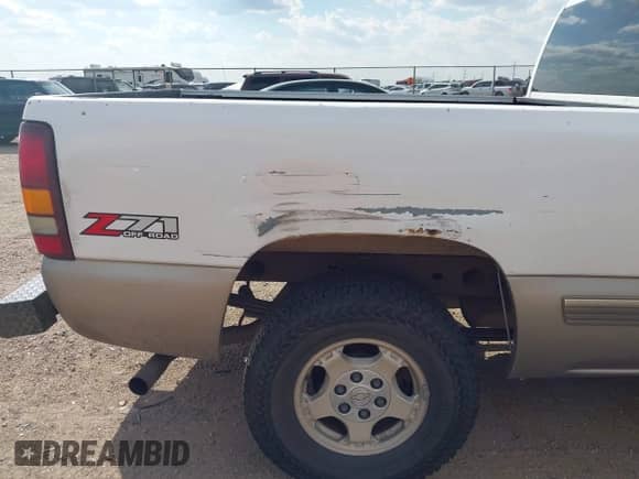 2002 Chevrolet Silverado 1500 LS with VIN 2GCEK19T521378079, listed as a IAAI auction lot 43242169 with 264,320 mi miles and . Bid and sale history available at DreamBid. Image 6.
