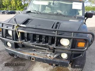 ✅ 2003 Hummer H2 • VIN: 5GRGN23U33H107154 • Lot: 43660171. Wystawiony na IAAI z przebiegiem Nie podano. Bezpłatny archiwum sprzedaży aukcyjnych z USA i szczegółowy raport historii pojazdu na DreamBid. Zdjęcie 6.