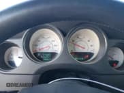 ✅ 2011 Dodge Challenger • VIN: 2B3CJ4DG5BH571394 • Lot: 44210305. Wystawiony na Copart z przebiegiem 138 688 mil. Bezpłatny archiwum sprzedaży aukcyjnych z USA i szczegółowy raport historii pojazdu na DreamBid. Zdjęcie 9.