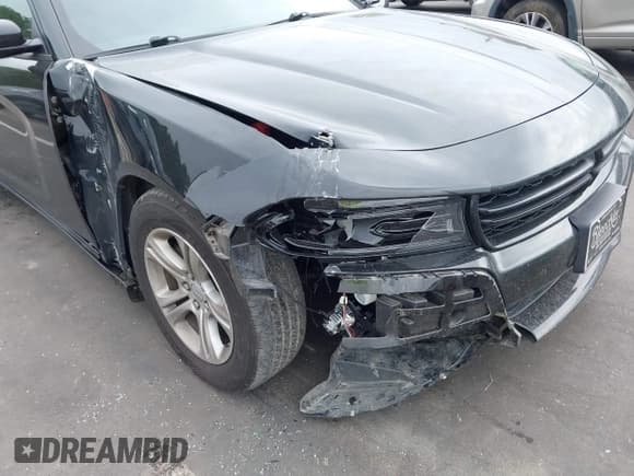✅ 2023 Dodge Charger SXT • VIN: 2C3CDXBG5PH579520 • Lot: 43245472. Listed on IAAI with 59,873 mi. Free auction sales archive from the USA and detailed vehicle history report at DreamBid. Image 6.