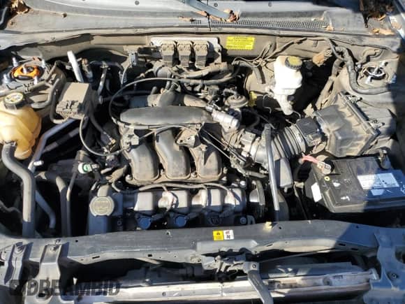 2005 Mercury Mariner Luxury с VIN 4M2CU56155DJ32163, выставлен на аукционе Copart как лот 82329855 с пробегом 270 884 миль миль и Списание • Salvage title. История ставок и продаж доступна на DreamBid. Изображение 12.