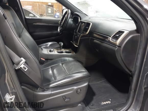 ✅ 2014 Jeep Grand Cherokee Overland • VIN: 1C4RJFCGXEC340052 • Lot: 43485667. Listed on IAAI with 113,840 mi. Free auction sales archive from the USA and detailed vehicle history report at DreamBid. Image 5.