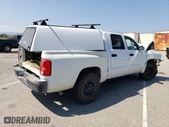 2007 Dodge Dakota ST z VIN 1D7HE28K37S227337, wystawiony jako Copart lot #68823855 z przebiegiem Nie podano mil oraz Szkoda całkowita • Salvage title. Historia ofert i sprzedaży dostępna na DreamBid. Obrazek 3.