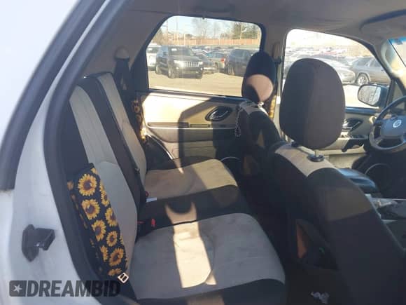 2006 Mercury Mariner Luxury z VIN 4M2YU571X6DJ04235, wystawiony jako IAAI lot #41631062 z przebiegiem 290 925 mil mil oraz . Historia ofert i sprzedaży dostępna na DreamBid. Obrazek 8.