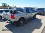 ✅ 2004 Ford Explorer Sport Trac XLS • VIN: 1FMZU77K34UA65740 • Lot: 43589534. Listed on IAAI with 310,281 mi. Free auction sales archive from the USA and detailed vehicle history report at DreamBid. Image 4.