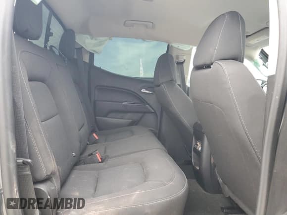 ✅ 2018 Chevrolet Colorado 2WD LT • VIN: 1GCGSCEN8J1129100 • Лот: 64276964. Опубликован ранее на Copart с пробегом 65 825 миль. Бесплатный доступ к архиву аукционных продаж из США и подробный отчёт об истории автомобиля на DreamBid. Изображение 11.