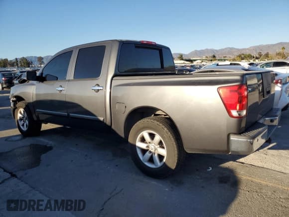 ✅ 2010 Nissan Titan LE • VIN: 1N6AA0ED2AN300198 • Lot: 85401215. Listed on Copart with 213,014 mi. Free auction sales archive from the USA and detailed vehicle history report at DreamBid. Image 2.