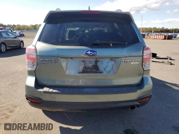 2017 Subaru Forester Limited with VIN JF2SJARC0HH523882, listed as a Copart auction lot 82651095 with 65,088 mi miles and Salvage title. Bid and sale history available at DreamBid. Image 6.