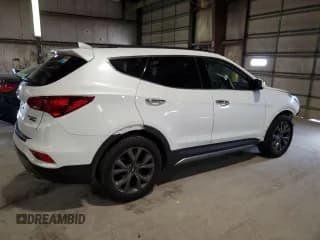 ✅ 2018 Hyundai Santa Fe Ultimate • VIN: 5NMZWDLA6JH054390 • Лот: 59157344. Опубликован ранее на Copart с пробегом 71 582 миль. Бесплатный доступ к архиву аукционных продаж из США и подробный отчёт об истории автомобиля на DreamBid. Изображение 3.