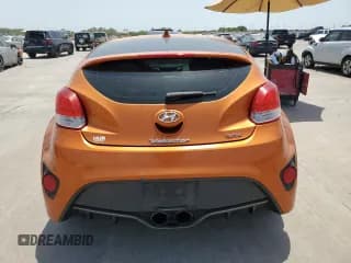 ✅ 2013 Hyundai Veloster Turbo • VIN: KMHTC6AE1DU167026 • Lot: 65680604. Wystawiony na Copart z przebiegiem 77 428 mil. Bezpłatny archiwum sprzedaży aukcyjnych z USA i szczegółowy raport historii pojazdu na DreamBid. Zdjęcie 6.