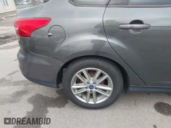 ✅ 2017 Ford Focus SE • VIN: 1FADP3F20HL271650 • Lot: 43634504. Listed on IAAI with 149,811 mi. Free auction sales archive from the USA and detailed vehicle history report at DreamBid. Image 12.