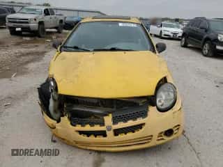 2003 Dodge Neon SXT z VIN 1B3ES56C63D192599, wystawiony jako Copart lot #53375775 z przebiegiem 179 277 mil mil oraz Czysty tytuł • Clean title. Historia ofert i sprzedaży dostępna na DreamBid. Obrazek 5.