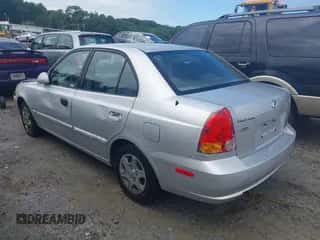 2004 Hyundai Accent GL z VIN KMHCG45C04U542714, wystawiony jako IAAI lot #42917213 z przebiegiem 172 011 mil mil oraz . Historia ofert i sprzedaży dostępna na DreamBid. Obrazek 3.
