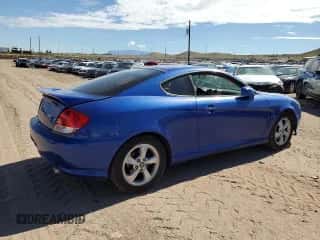2005 Hyundai Tiburon GS с VIN KMHHM65D55U174406, выставлен на аукционе Copart как лот 64487555 с пробегом 206 900 миль миль и Списание • Salvage title. История ставок и продаж доступна на DreamBid. Изображение 3.
