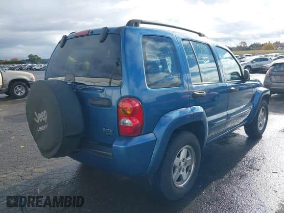 ✅ 2004 Jeep Liberty Limited • VIN: 1J4GL58KX4W232319 • Lot: 40870366. Listed on IAAI with 226,249 mi. Free auction sales archive from the USA and detailed vehicle history report at DreamBid. Image 4.