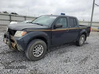 ✅ 2015 Nissan Frontier SV • VIN: 1N6AD0EVXFN712537 • Lot: 69694745. Listed on Copart with 201,847 mi. Free auction sales archive from the USA and detailed vehicle history report at DreamBid. Image 1.