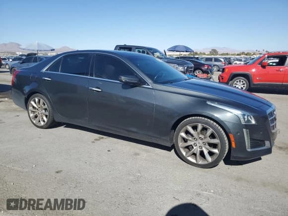 ✅ 2014 Cadillac CTS Premium AWD • VIN: 1G6AZ5S34E0123356 • Lot: 69327504. Listed on Copart with 136,292 mi. Free auction sales archive from the USA and detailed vehicle history report at DreamBid. Image 4.