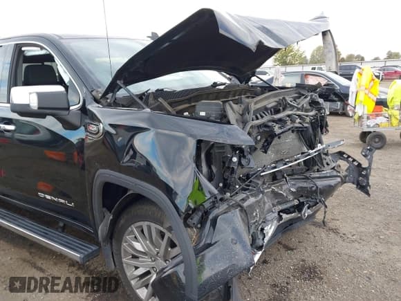 ✅ 2019 GMC Sierra 1500 Denali • VIN: 1GTU9FEL0KZ302500 • Лот: 43504711. Опубликован ранее на IAAI с пробегом 76 691 миль. Бесплатный доступ к архиву аукционных продаж из США и подробный отчёт об истории автомобиля на DreamBid. Изображение 22.