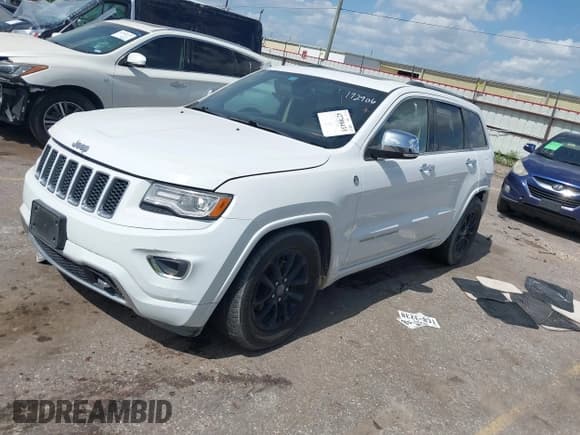 ✅ 2015 Jeep Grand Cherokee Overland • VIN: 1C4RJFCG0FC609466 • Lot: 42788433. Listed on IAAI with 155,076 mi. Free auction sales archive from the USA and detailed vehicle history report at DreamBid. Image 2.