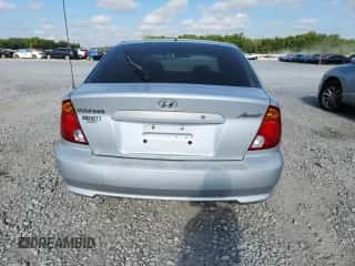 2004 Hyundai Accent GL с VIN KMHCG35C34U300980, выставлен на аукционе Copart как лот 66034315 с пробегом 111 654 миль миль и Списание • Salvage title. История ставок и продаж доступна на DreamBid. Изображение 6.