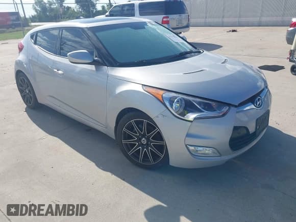 ✅ 2012 Hyundai Veloster w/Red Int • VIN: KMHTC6AD4CU053866 • Lot: 43278884. Wystawiony na IAAI z przebiegiem 155 497 mil. Bezpłatny archiwum sprzedaży aukcyjnych z USA i szczegółowy raport historii pojazdu na DreamBid. Zdjęcie 1.