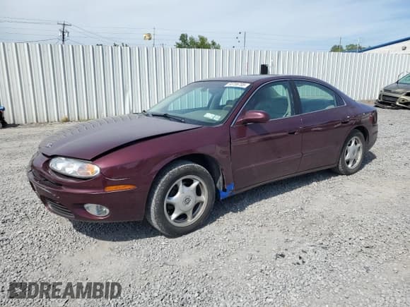 ✅ 2003 Oldsmobile Aurora • VIN: 1G3GS64C134163544 • Lot: 58706705. Listed on Copart with 104,447 mi. Free auction sales archive from the USA and detailed vehicle history report at DreamBid. Image 1.