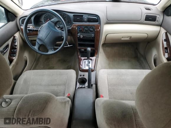 ✅ 2003 Subaru Legacy Outback • VIN: 4S3BH665937644454 • Lot: 57404695. Listed on Copart with 242,345 mi. Free auction sales archive from the USA and detailed vehicle history report at DreamBid. Image 8.