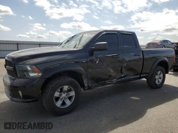 2016 Ram 1500 Express with VIN 1C6RR7FG6GS284573, listed as a Copart auction lot 71500705 with 146,947 mi miles and Salvage title. Bid and sale history available at DreamBid. Image 1.
