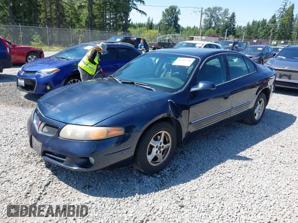 ✅ 2002 Pontiac Bonneville SE • VIN: 1G2HX54KX24137874 • Lot: 42443136. Listed on IAAI with 176,022 mi. Free auction sales archive from the USA and detailed vehicle history report at DreamBid. Image 2.