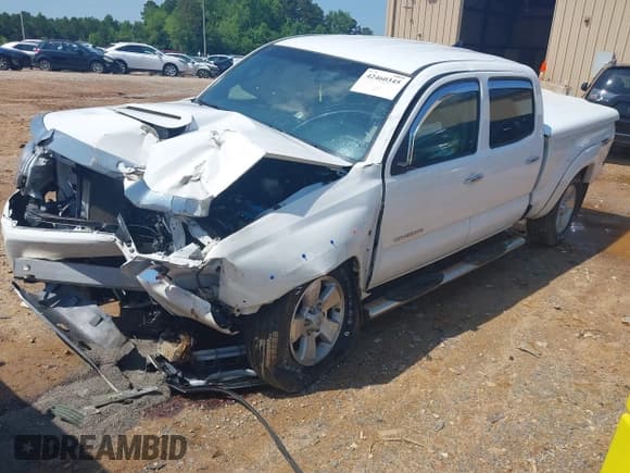 ✅ 2015 Toyota Tacoma PreRunner • VIN: 5TFKU4HN3FX007156 • Lot: 42460345. Listed on IAAI with 123,563 mi. Free auction sales archive from the USA and detailed vehicle history report at DreamBid. Image 2.