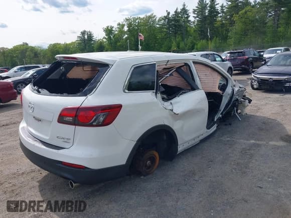 ✅ 2014 Mazda CX-9 Sport • VIN: JM3TB3BV5E0440313 • Lot: 42342145. Listed on IAAI with 117,946 mi. Free auction sales archive from the USA and detailed vehicle history report at DreamBid. Image 4.