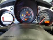 ✅ 2012 Nissan 370Z • VIN: JN1AZ4EH3CM560241 • Lot: 90007155. Wystawiony na Copart z przebiegiem 97 967 mil. Bezpłatny archiwum sprzedaży aukcyjnych z USA i szczegółowy raport historii pojazdu na DreamBid. Zdjęcie 9.