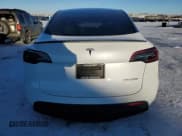 ✅ 2022 Tesla Model Y Performance • VIN: 7SAYGDEF2NF326025 • Lot: 87751035. Wystawiony na Copart z przebiegiem 35 538 mil. Bezpłatny archiwum sprzedaży aukcyjnych z USA i szczegółowy raport historii pojazdu na DreamBid. Zdjęcie 6.