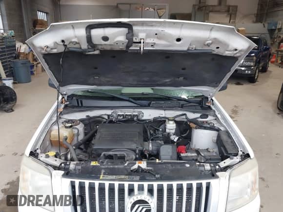 2009 Mercury Mariner with VIN 4M2CU81G99KJ23156, listed as a IAAI auction lot 42715313 with 199,805 mi miles and . Bid and sale history available at DreamBid. Image 10.