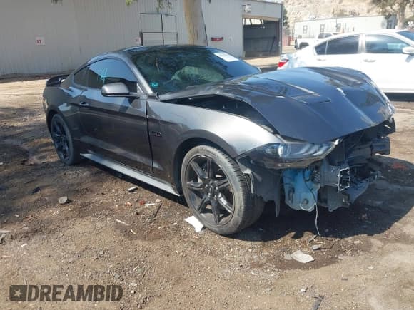 ✅ 2020 Ford Mustang GT Premium • VIN: 1FA6P8CF1L5182597 • Lot: 43175435. Listed on IAAI with 62,035 mi. Free auction sales archive from the USA and detailed vehicle history report at DreamBid. Image 1.
