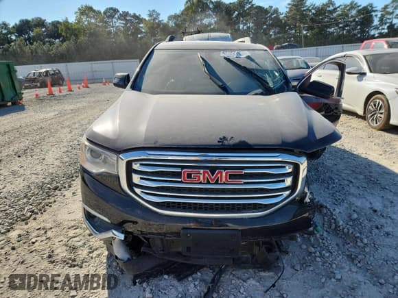 ✅ 2017 GMC Acadia SLT • VIN: 1GKKNULS2HZ323654 • Lot: 84941165. Wystawiony na Copart z przebiegiem 131 905 mil. Bezpłatny archiwum sprzedaży aukcyjnych z USA i szczegółowy raport historii pojazdu na DreamBid. Zdjęcie 5.