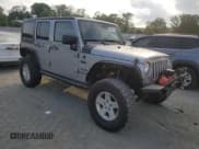 ✅ 2016 Jeep Wrangler Unlimited Sport • VIN: 1C4BJWDG2GL185774 • Lot: 57407015. Listed on Copart with 124,568 mi. Free auction sales archive from the USA and detailed vehicle history report at DreamBid. Image 4.