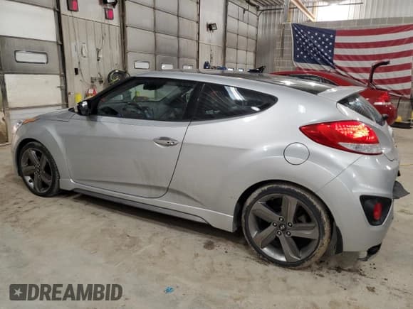 ✅ 2015 Hyundai Veloster Turbo • VIN: KMHTC6AE8FU234840 • Lot: 43930865. Wystawiony na Copart z przebiegiem 107 201 mil. Bezpłatny archiwum sprzedaży aukcyjnych z USA i szczegółowy raport historii pojazdu na DreamBid. Zdjęcie 2.