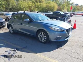✅ 2014 Mazda 3 i Grand Touring • VIN: JM1BM1M75E1117066 • Lot: 43425599. Listed on IAAI with 113,160 mi. Free auction sales archive from the USA and detailed vehicle history report at DreamBid. Image 1.
